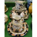 1930s Staffordshire teaset, a teapot and decorative plates.