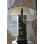 An Oriental table lamp and shade.