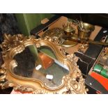 A gilt framed wall mirror, chestnut roaster, etc.