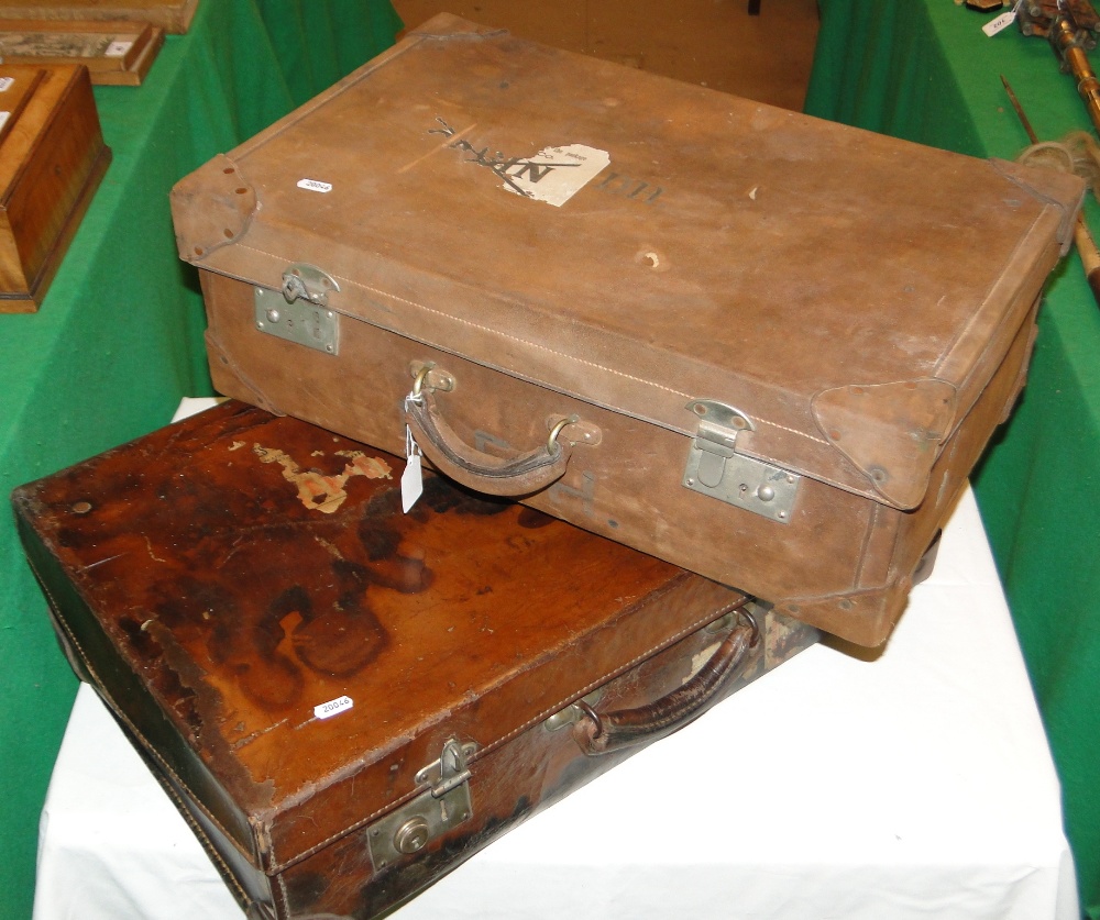 2 Vintage leather suitcases.