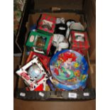 A box of Disney souvenir plates, Christmas baubles, etc.