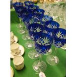 2 Sets of 6 blue overlay crystal goblets.