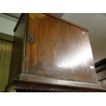 An 18th century oak collector's cabinet, with fitted interior.