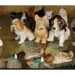 8 Dog figures including Sylvac, and a pair of Keele Street Pottery flying ducks.