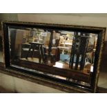 19th century ebonised wall mirror.