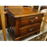 An Ipswich oak design 2-drawer chest on bracket feet.