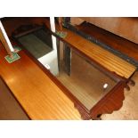 A Chippendale style mahogany rectangular wall mirror.