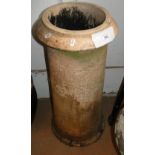 A terracotta chimney pot.