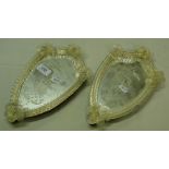 A pair of engraved Venetian style small wall mirrors.