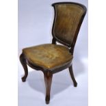 A Victorian leather upholstered shield back desk chair,