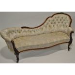 A Victorian walnut framed chair back parlour sofa,