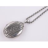 A Victorian engraved silver locket on chain, 1881, length excluding bale 45mm.