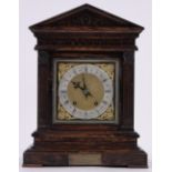 A Victorian carved oak cased architectural mantel clock, 8-day striking movement, height 41cm.