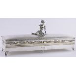 A continental Art Nouveau electroplate box, surmounted by a reclining female figure,