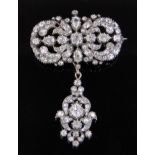 A fine quality late 19th century diamond set pendant brooch, converting to 2 separate pieces,