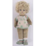 A pressed felt doll circa 1930, probably Norah Wellings for Chad Valley,