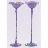 A pair of delicate tall marbled coloured glass ornamental dishes on tall stems, height 31cm.