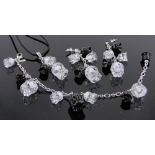 A suite of Lalique Muguet silver and crystal jewellery, comprising a charm bracelet,