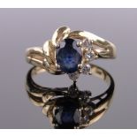 An 18ct gold sapphire and diamond cluster ring, setting height 11mm, size M.