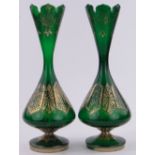 Pair of 19th century Bohemian green glass narrow necked vases,