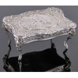 A 19th century Dutch silver dolls house dining table, cast classical design top,