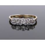 An 18ct gold 5 stone diamond ring, setting width 15mm, size O.