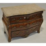 A French Kingwood marble topped Bombe commode in Louis XVI style,