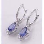 Pair of 14ct white gold marquise cut tanzanite and diamond drop earrings,