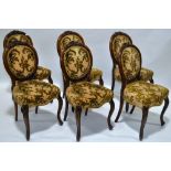 A set of 6 Victorian walnut spoon back dining chairs,