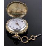 A Middle Eastern brass cased full hunter pocket watch, dial signed E R Khazam of Baghdad,