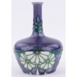 A Minton Secessionist narrow necked vase, tube-lined geometric designs, serial no. 32, height 12cm.