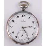 An Omega Swiss silver cased topwind pocket watch, Omega dust cover, serial no.