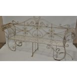 An early 20th century wrought-iron garden bench,