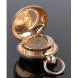 A Victorian 9ct gold filled sovereign case, 29mm across.