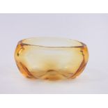 A Whitefriars Studio glass bowl, designed by James Hogan 1940-1946, golden amber, pattern no.