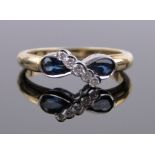 An 18ct gold pear-cut sapphire and diamond set ring, setting width 12mm, size L.