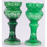 A pair of Bohemian green overlay glass ornamental jardinieres, height 36cm, diameter 16cm.