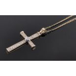 A 9ct gold diamond set cross pendant on gold chain, total diamond content approx. 0.