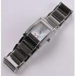 A lady's Rotary quartz wristwatch, stainless steel case and strap with mother of pearl dial,