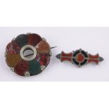 A Scottish hardstone inset target shaped brooch,