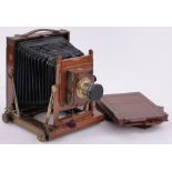 A Victorian mahogany and brass cased plate camera, Time & Inst.