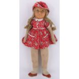 A pressed felt girl doll circa 1930, probably Deans Rag Book co,