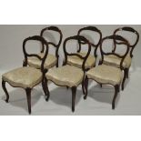 A set of 6 Victorian rosewood balloon back dining chairs,