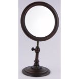 A 19th century rosewood table top shaving mirror, adjustable brass column on carved circular base,