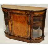 A Victorian figured walnut credenza, bow glass panelled ends with marquetry inlaid central door,