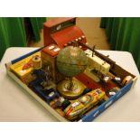 A child's toy cash register, sewing machine, globe, etc.