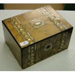 A Victorian walnut travelling box with mother of pearl and marquetry bands and fitted interior,