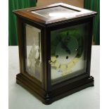 A mahogany cased 3-train mantel clock by J Kieninger.