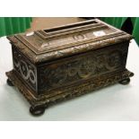 A carved oak ballot box.