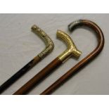 A walking stick with white metal mount and 2 others, (3).